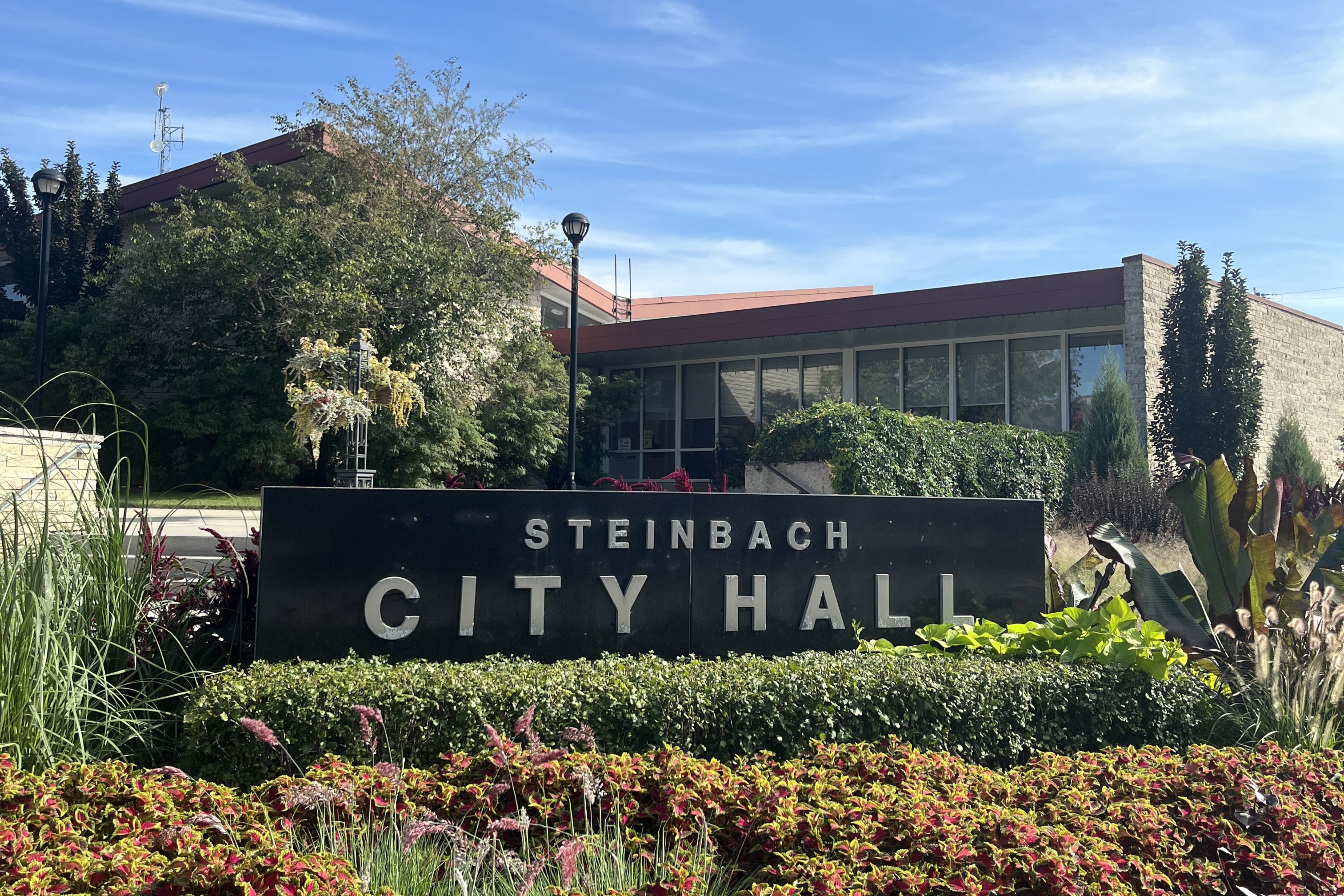 A photo of the City Hall sign