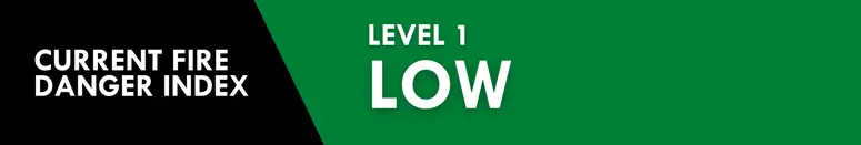 White reads, "CURRENT FIRE DANGER INDEX / LEVEL 1 LOW" over a black and green background