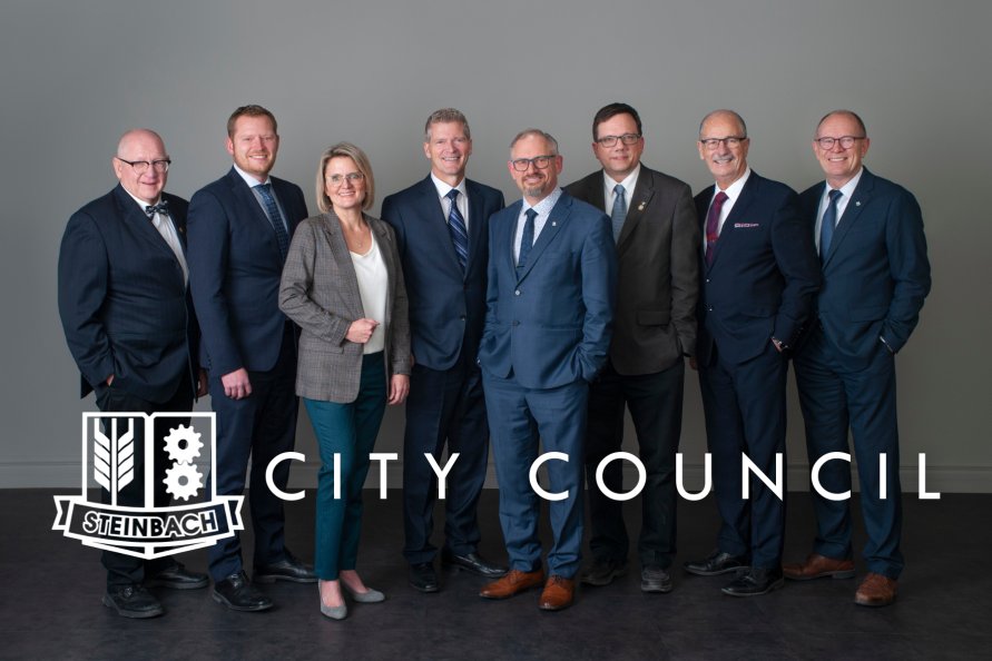 Steinbach City Council featuring from left to right: Councillor Jac Siemens, Councillor Damian Penner, Councillor Susan Penner, City Manager Troy Warkentin, Mayor Earl Funk, Councillor Michael Zwaagstra, Councillor Jake Hiebert and Councillor Bill Hiebert
