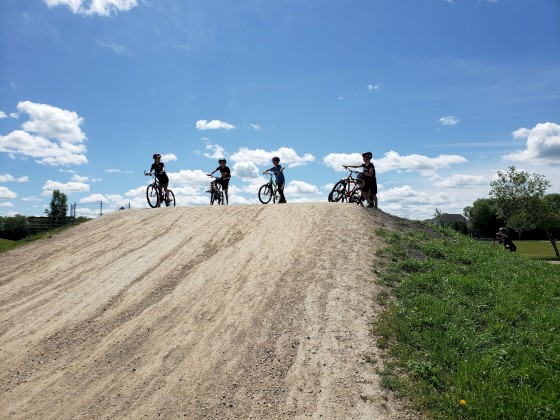 Campers on top of the hill at the BMX Track at AD Penner Park.